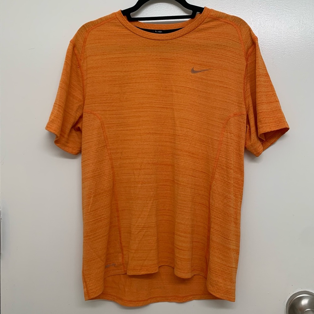 Nike running heathered bright orange dri fit short sleeve top large.